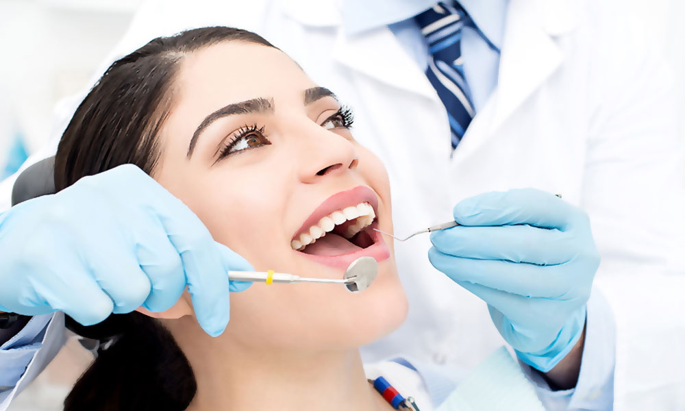 Is it okay to visit a dentist once a year? 